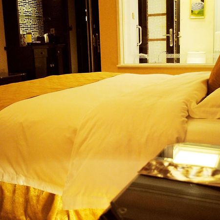 Datong Weidu International Hotel Номер фото